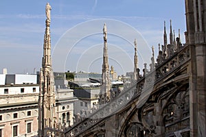 Stone-carved lace of sculptures and spires of the Cathedral, Milan, Italy