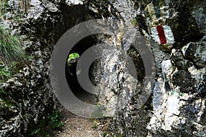 Stone carved tunnel in Nera Gorges Natural Park, Romania, Europe