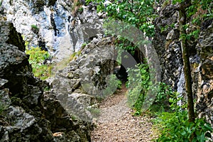 Stone carved tunnel in Nera Gorges Natural Park, Romania, Europe