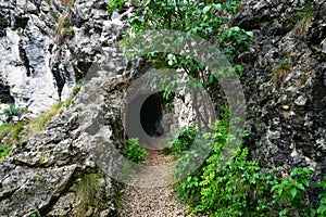 Stone carved tunnel in Nera Gorges Natural Park, Romania, Europe