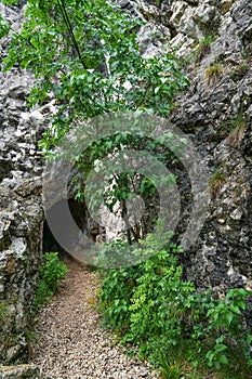 Stone carved tunnel in Nera Gorges Natural Park, Romania, Europe