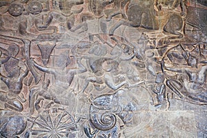 Stone Carving, all around on the wall at Angkor wat