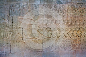 Stone Carving, all around on the wall at Angkor wat