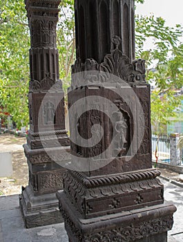 Stone carving art with human  figure on the pillar of ancient architecture of India