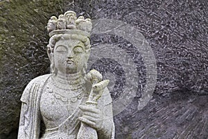 Stone carving buddha statue sculpture in Japanese style at Japan temple