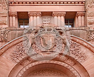 Stone carving of the coat of arms of the Province of Ontario