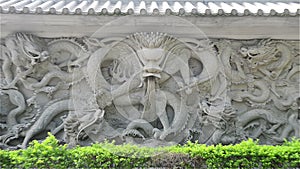 Stone carving of Dragon zooming