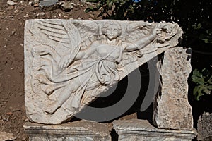 Stone carving of the goddess Nike in Ephesus Ancient City