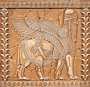 Stone Carving Lamassu or Shedu in Mesopotamia mitology photo