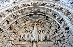 Stone carvings on the entrance of The church of Notre Dame du Sablon, Brussels