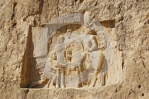 Stone carvings on Tomb of Darius the Great,Persepolis, Iran. photo