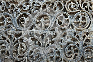 Stone carvings on the walls of the ancient temple.