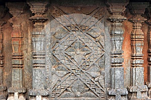 Stone carvings on the walls of the ancient temple.