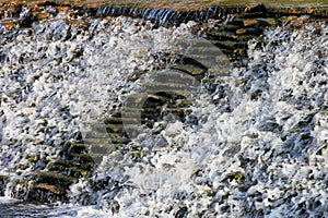 Stone cascade with flowing water