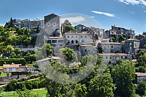 Stone castle and homes in the medieval town of Balazuc in France.