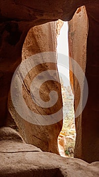 Stone cave houses and ancient monasteries with volcanic rock landscape at Zelve Valley in Cappadocia, Turkey