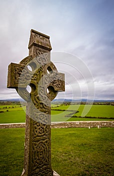 Stone Celtic cross in a graveyard