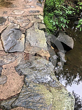 Stone and cement trail bridge at Dells of Eau Claire