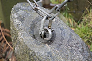 Stone with a Chain Attached to it