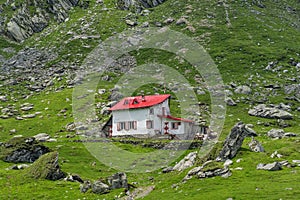 Stone chalet in Carpathians mountains in the summer season