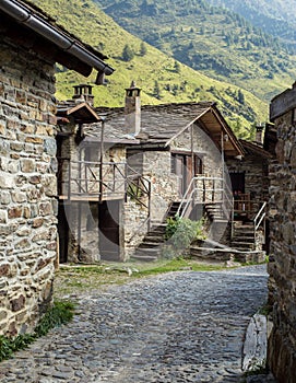 Stone chalets in a tiny mountaing village. Case di Viso - Ponte photo