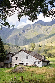 Stone chalets in a tiny mountaing village. Case di Viso - Ponte photo