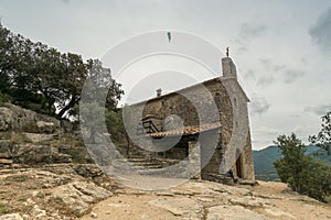 Stone chapel trees & paragliding