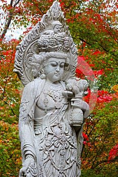 Stone Chinese Godess statue Quanyim at Eikando Zenrinji Temple in Kyoto