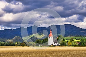 Church of St. Ladislav in Liptovske Matiasovce in front of Chocske vrchy