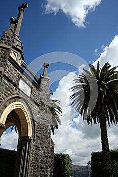 Stone church and palm tree