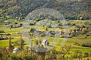 Stone church in springtime mountain nature