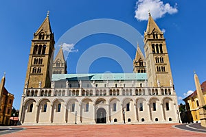 stone church towers. stone cathedral in the town of Pecs in Hungary in neo Romanesque style