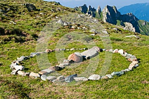 Stone circle sign in the mountains