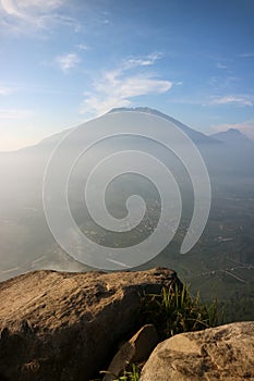 Stone cliff with mountain on background