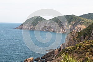 The stone coast of Vietnam. Large boulders on the beach.