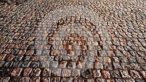Stone, cobblestone or bricks pavement texture and background. Old World Charm. Abstract pattern, frame, place for text
