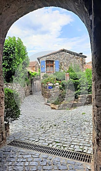 In the stone and cobblestone village of Naves photo