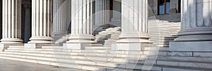 Stone columns colonnade and marble stairs detail. Classical pillars row