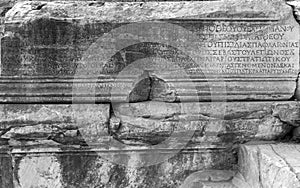 Stone columns written in ancient Greek in the open air museum of Turkey, Izmir, Ephesus. close up