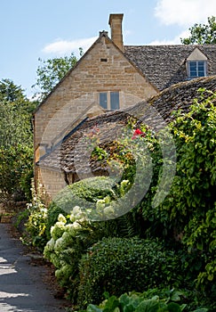 Stone cottage in the unspoilt picturesque Cotswold village of Stanton in Gloucestershire UK.