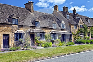 Stone Cottages in rural English village by a road