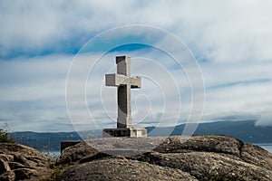 Stone cross in Cape Finisterre photo