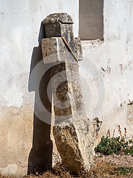 Stone cross at Comana Monastery, Romania