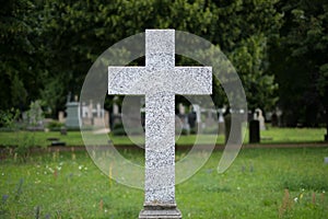 Stone cross gravestones on cemetery - graveyard