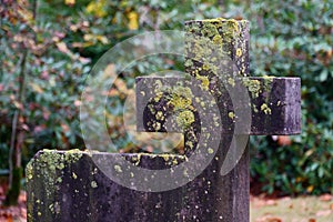 Stone cross on historic cemetery in Lommel, Belgium