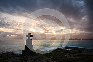 Stone cross monuments by the sea in the sunrise, Castro Urdiales, Cantabria