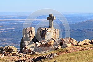 Stone cross near Santuario De Nuestra Senora De La Pena De Francia, Spain photo