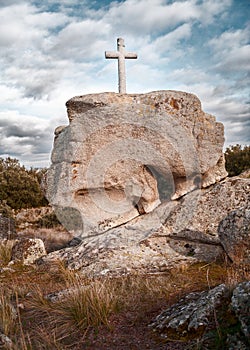 Stone cross with sky background dusk cloudy