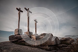 Stone cross with sky background dusk cloudy