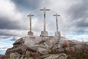 Stone cross with sky background dusk cloudy photo